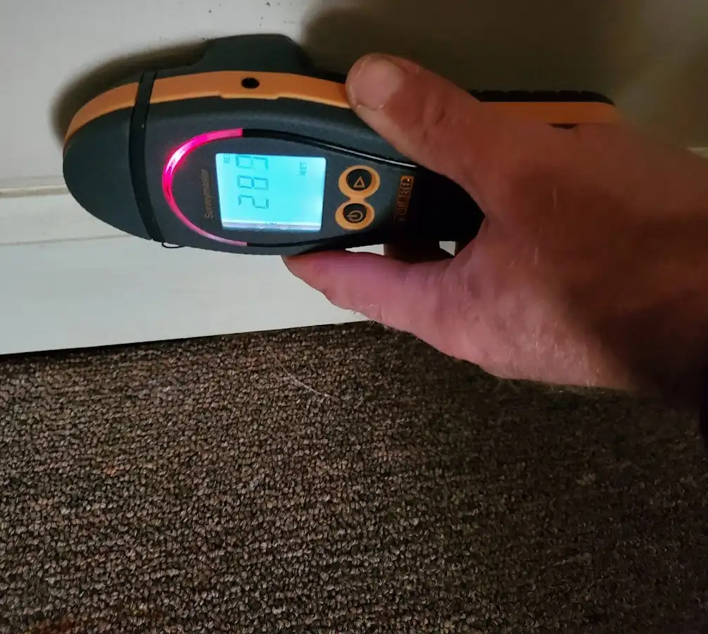 Moisture detection at baseboard during Storm Damage Restoration in Skiatook